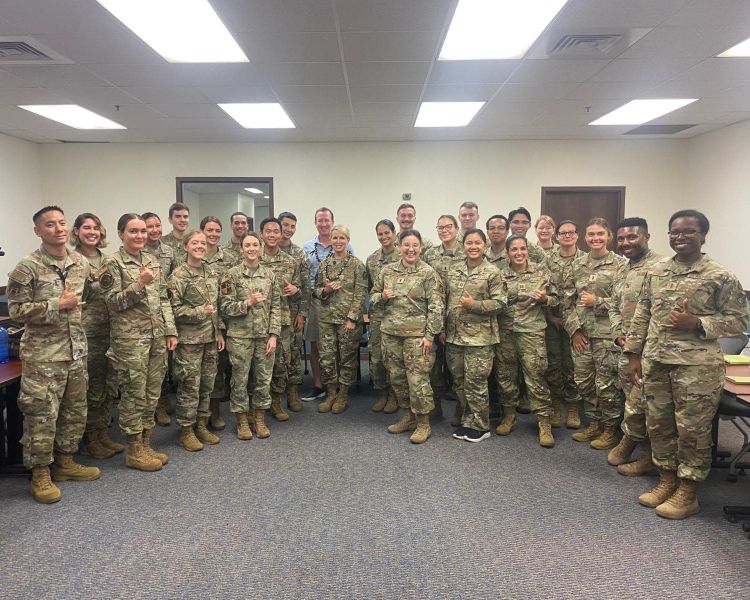 group photo of uniformed service members.
