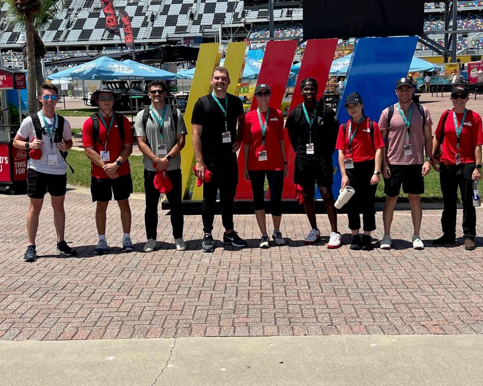 group photo of people at daytona speedway.